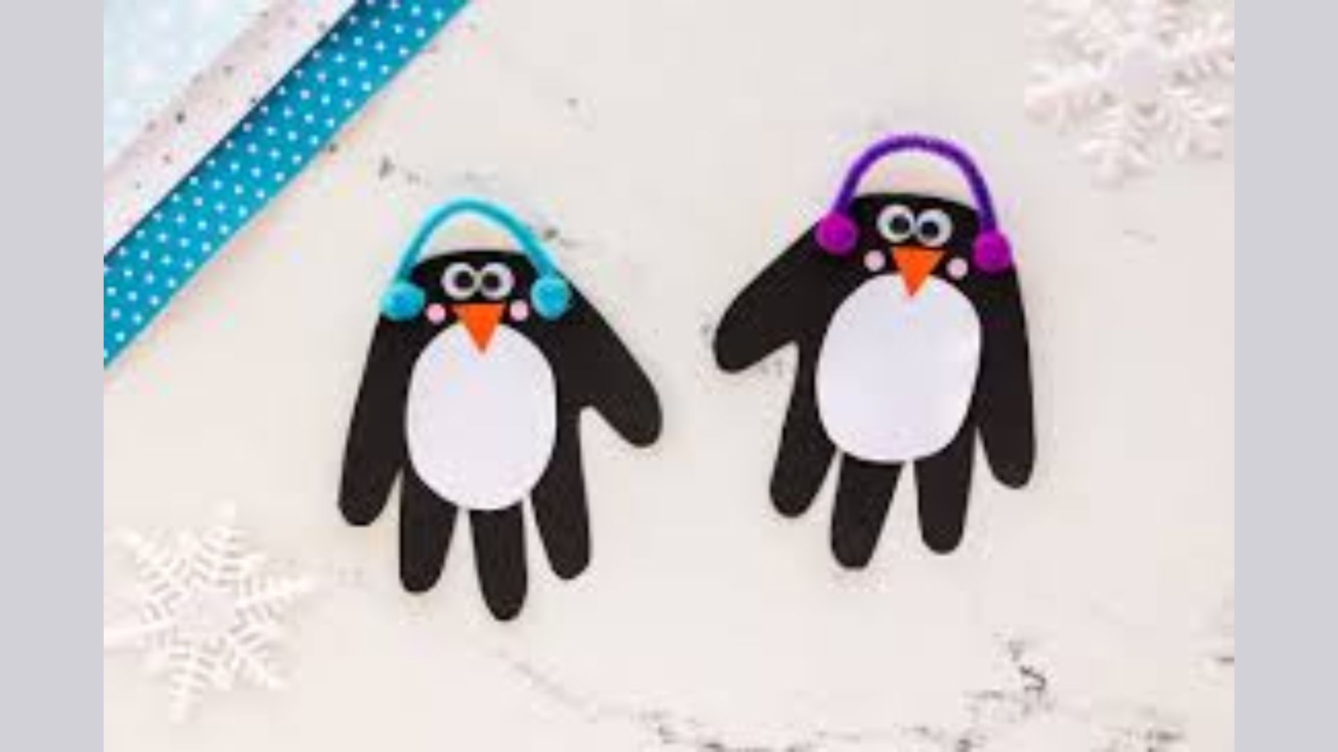 Colorful handprint craft depicting a penguin, designed for children's art activities.