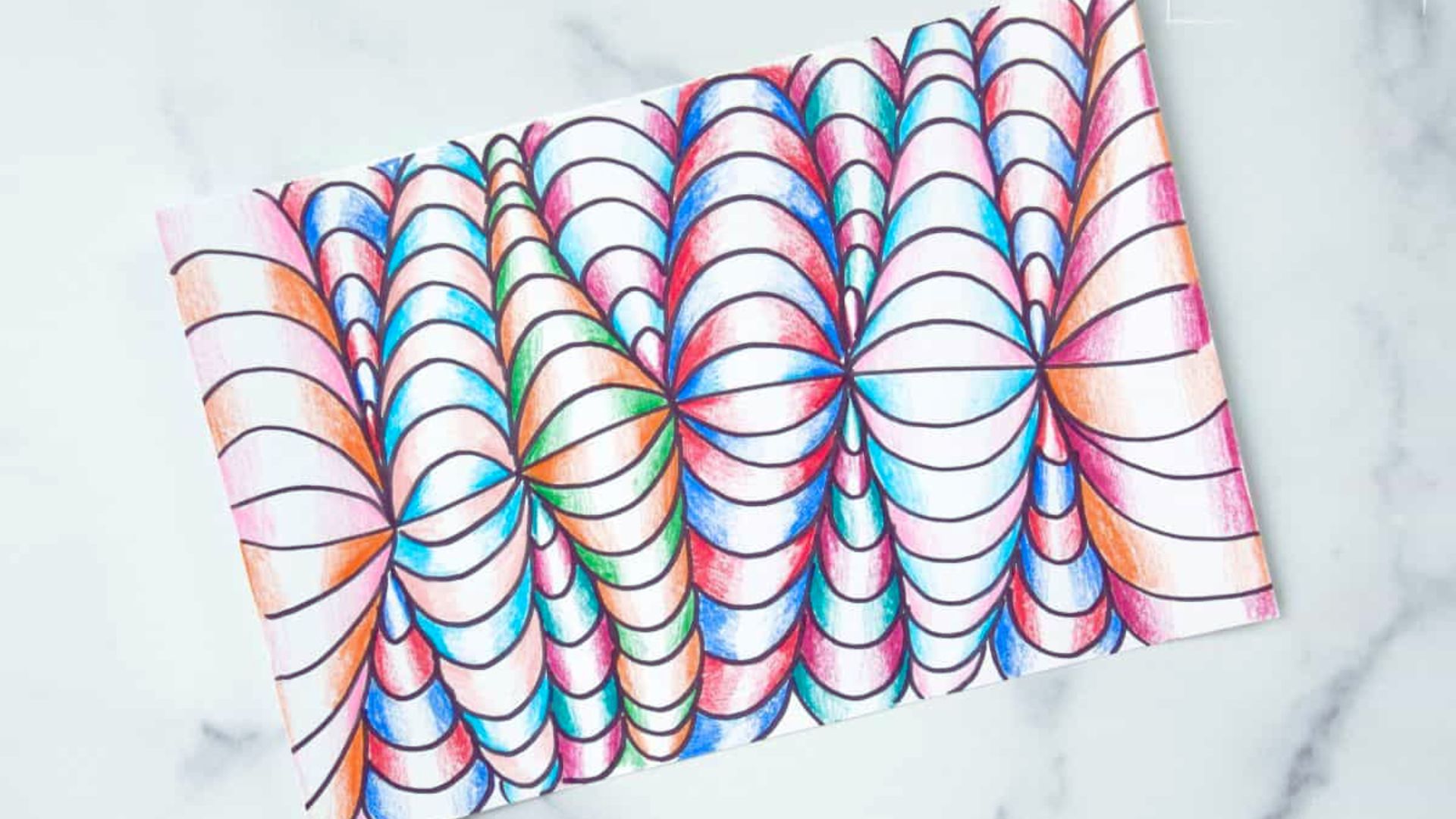 A vibrant drawing featuring various colors on a white surface against a plain white background.