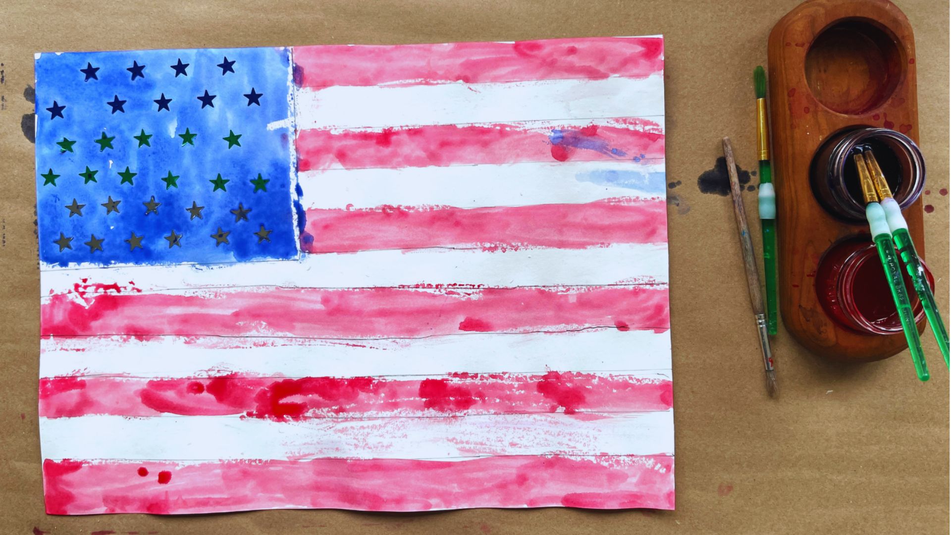Watercolor painting of the American flag, showcasing vibrant red, white, and blue colors in a fluid artistic style.