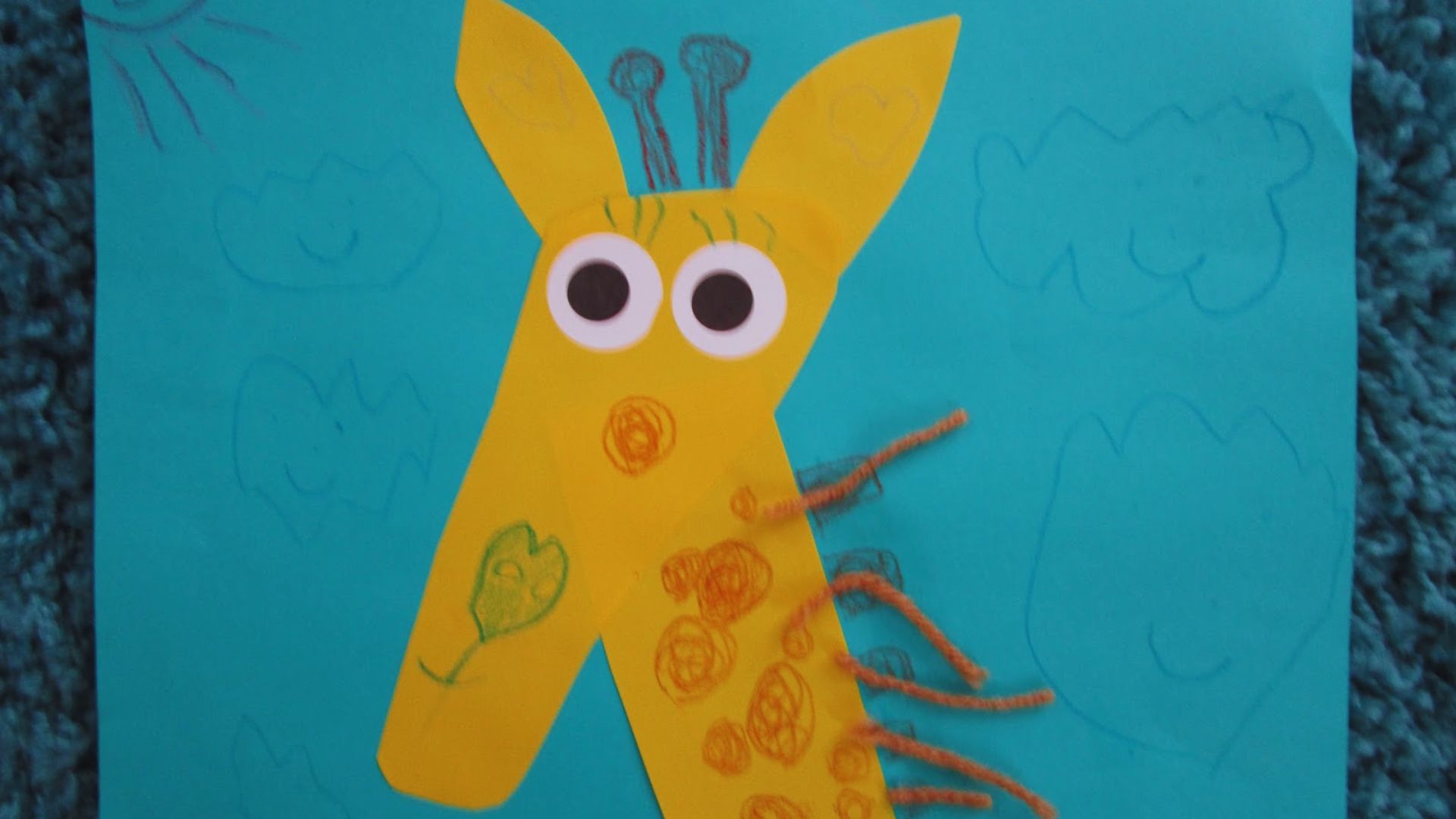 A whimsical giraffe made from a footprint, complete with eyes and a nose, highlighting artistic ingenuity.