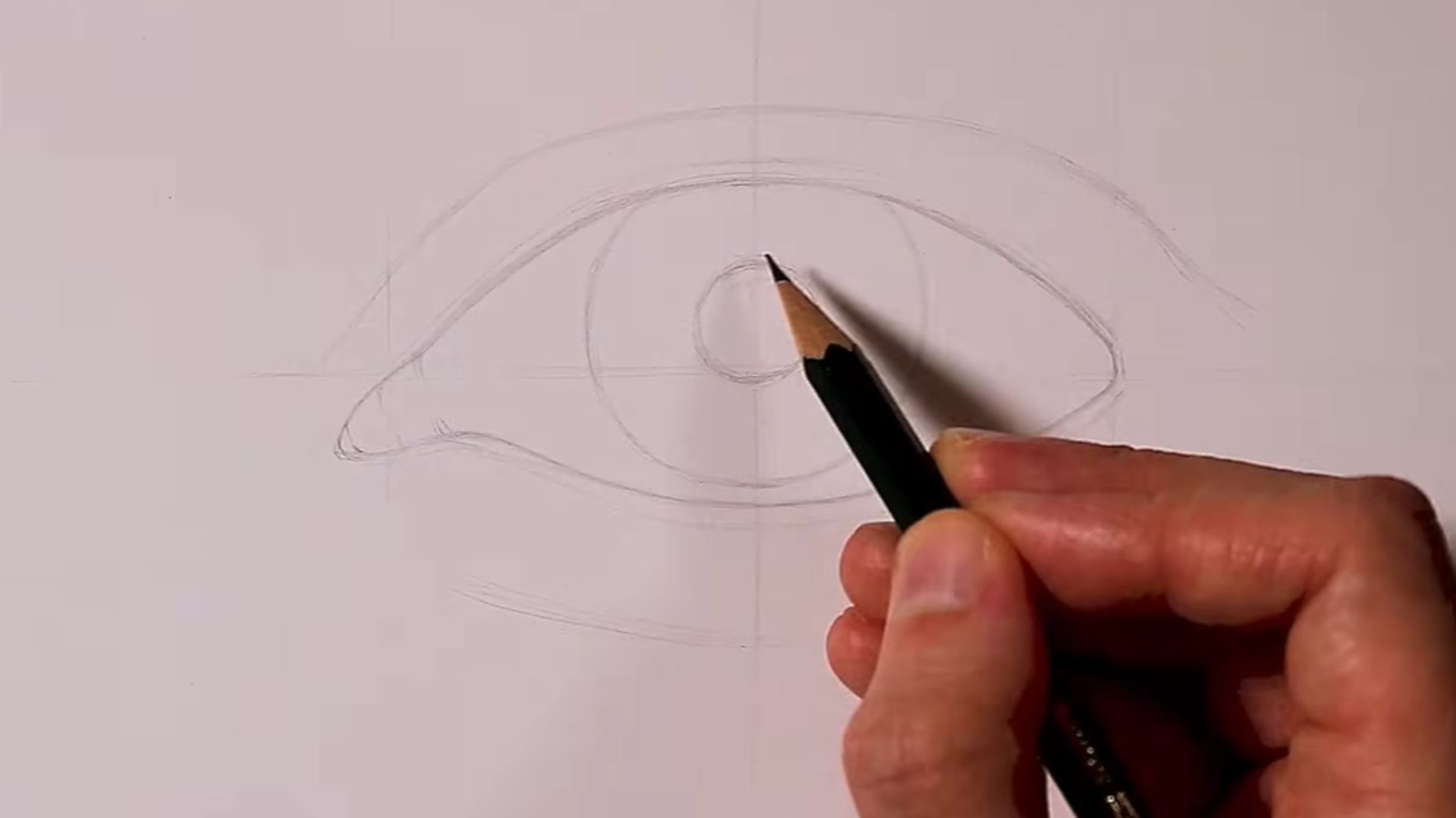 Step-by-step guide illustrating the process of drawing an eye, featuring detailed sketches and instructions.