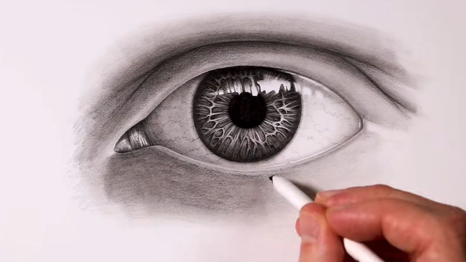 Step-by-step guide on drawing realistic eyes, showcasing techniques and tips for achieving lifelike details.