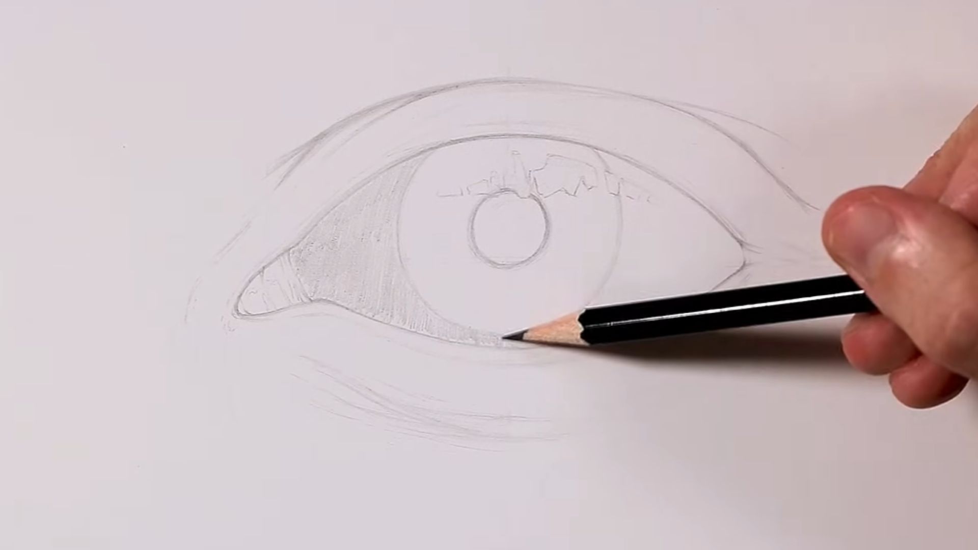 Step-by-step guide illustrating how to draw an eye, featuring detailed sketches and instructions for each stage.