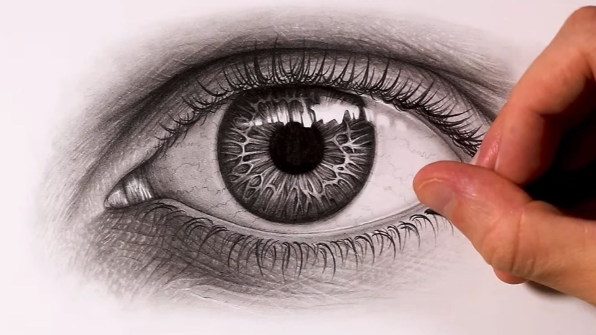 Step-by-step guide on drawing realistic eyes, showcasing techniques and tips for achieving lifelike details.