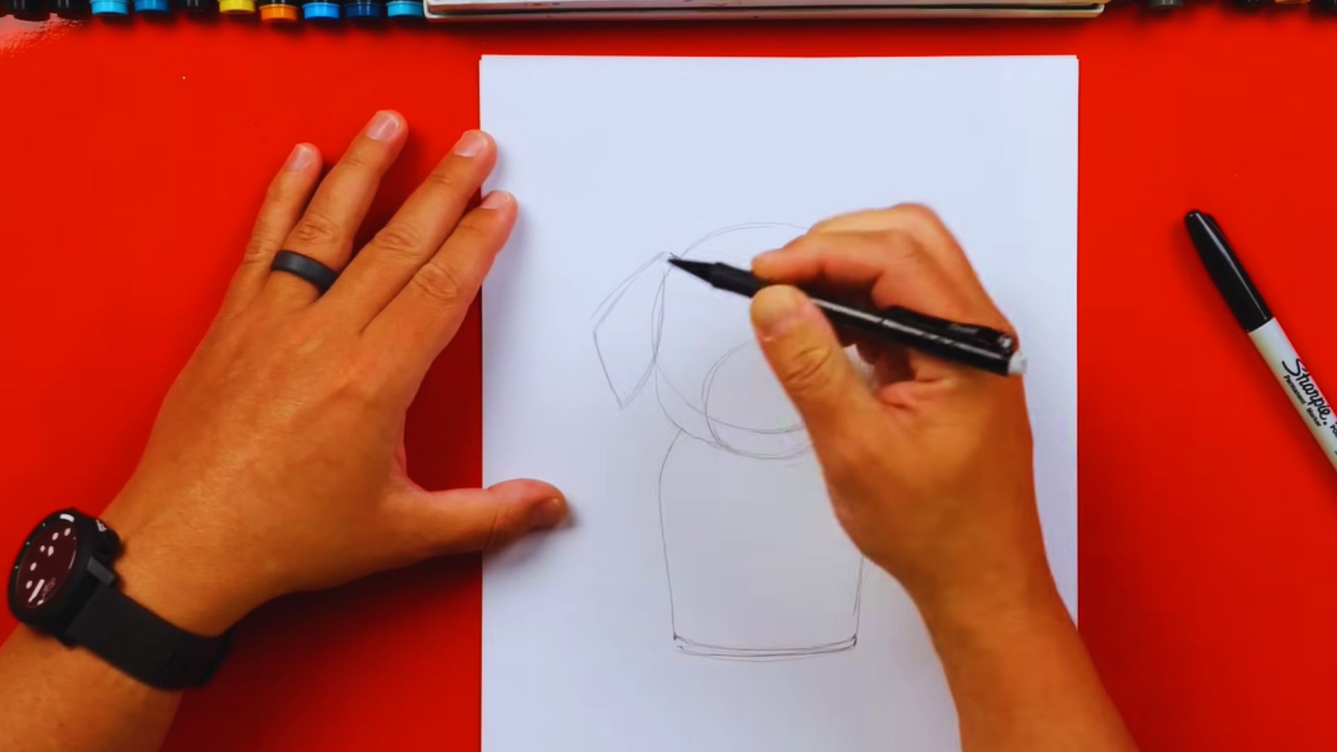 Step-by-step guide illustrating how to draw a dog, featuring simple shapes and lines for beginners.
