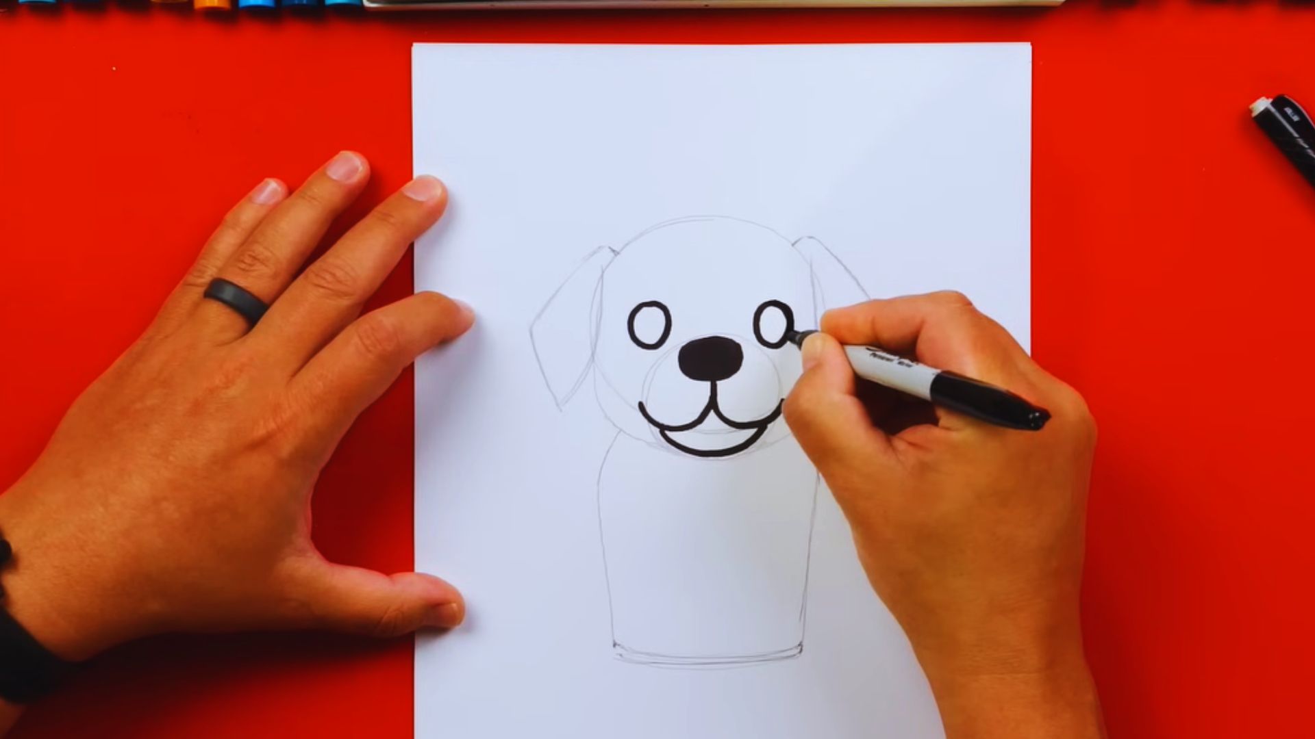 Step-by-step guide illustrating how to draw a dog, featuring simple shapes and lines for beginners.