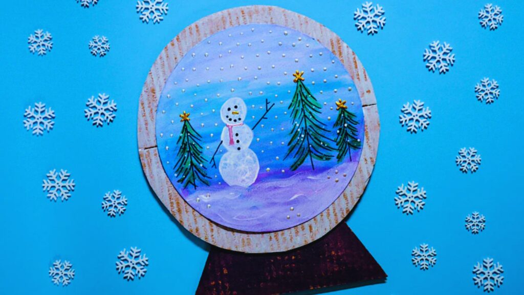 A snow globe featuring a cheerful snowman surrounded by falling snowflakes.