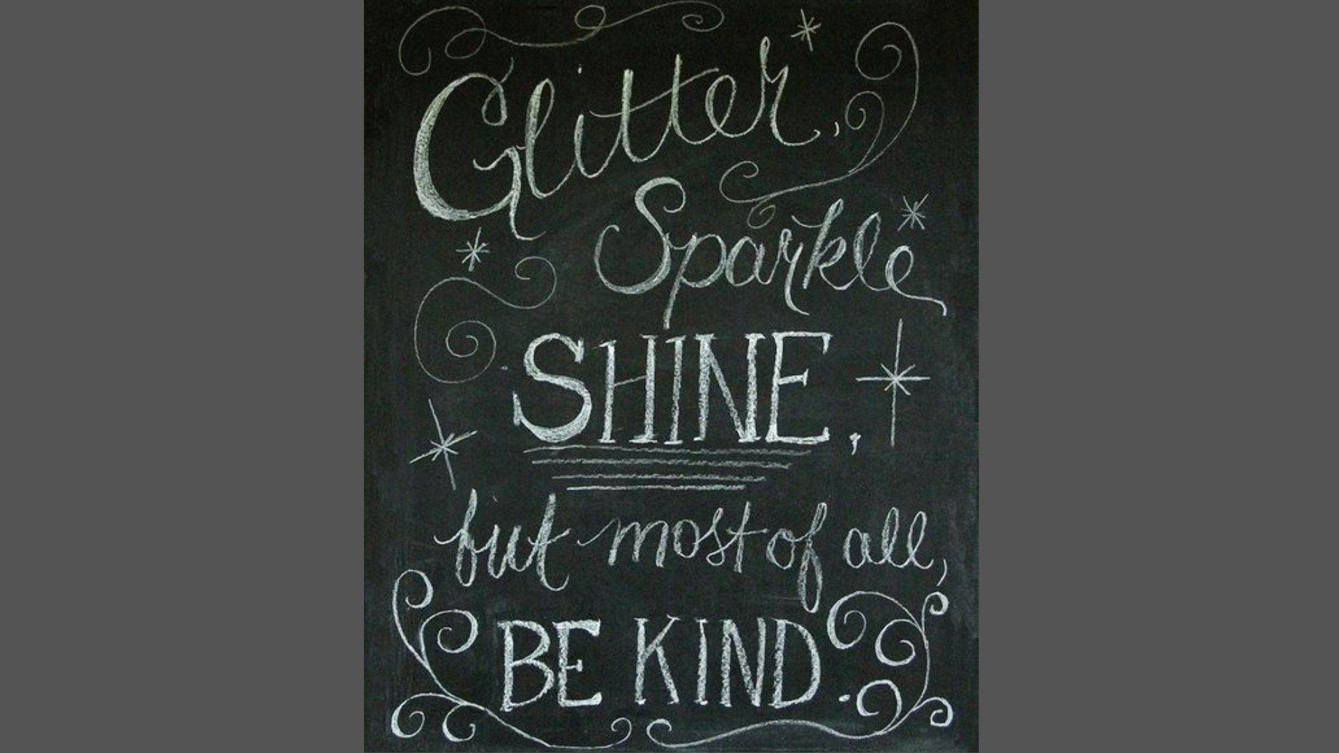 Chalkboard art featuring a love quote, creatively designed with colorful chalk on a black background.