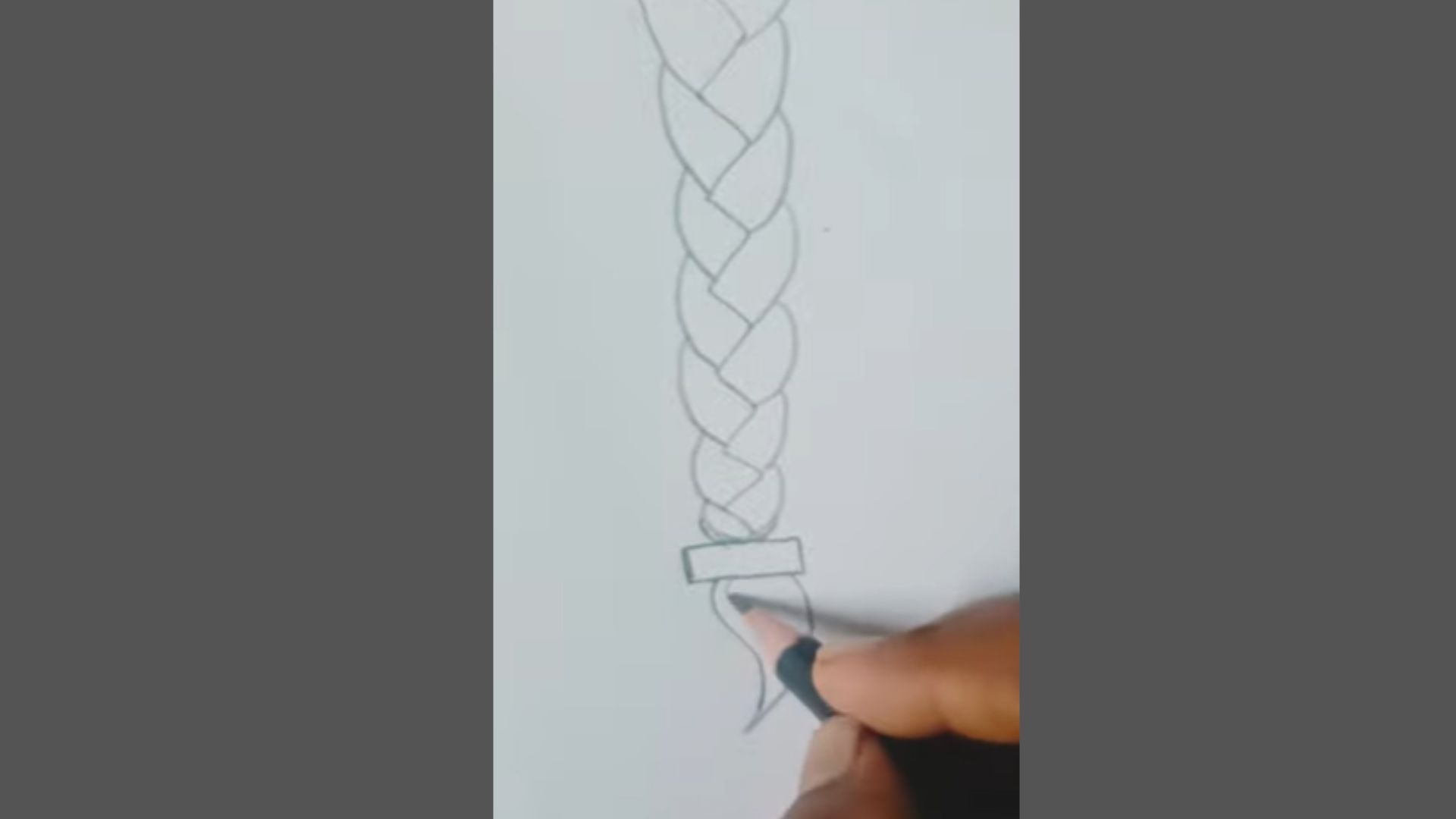 Top section smoothed with clear, balanced braid strands.