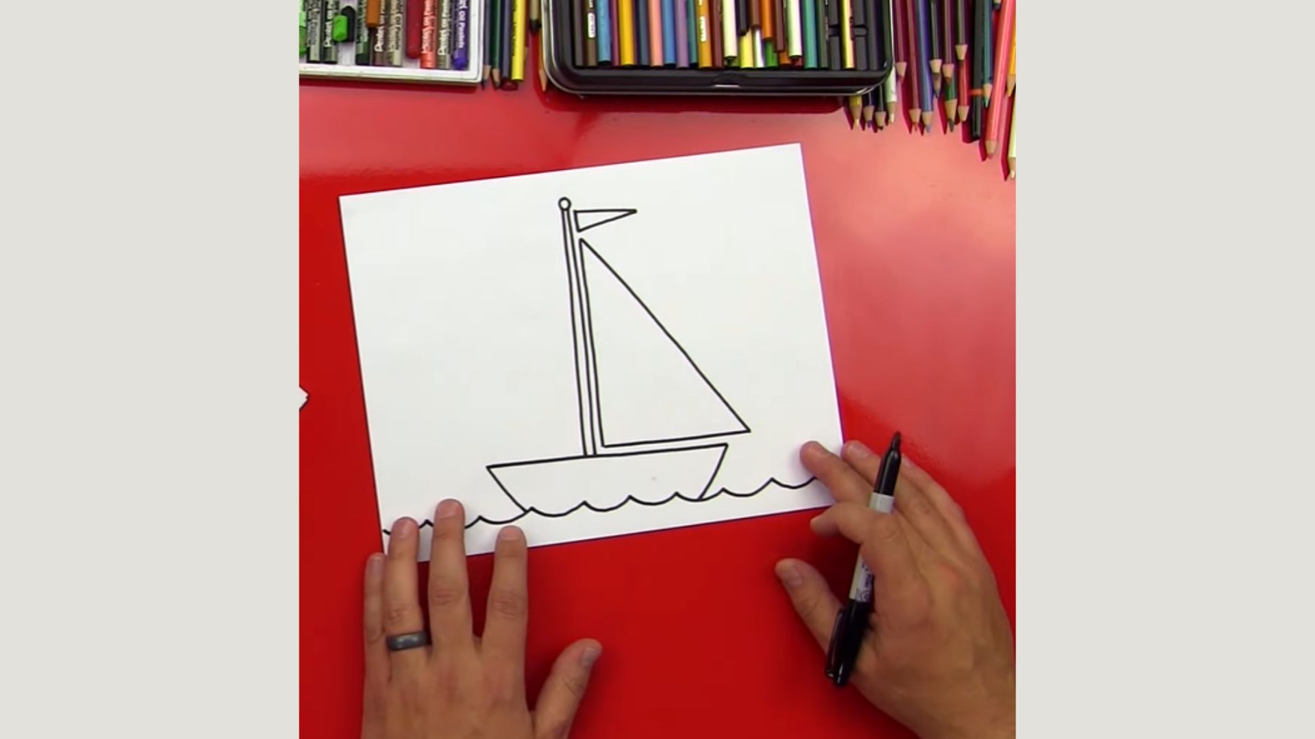 "Visual tutorial depicting the sequential steps to draw a sailboat, designed to assist beginners in their artistic journey."