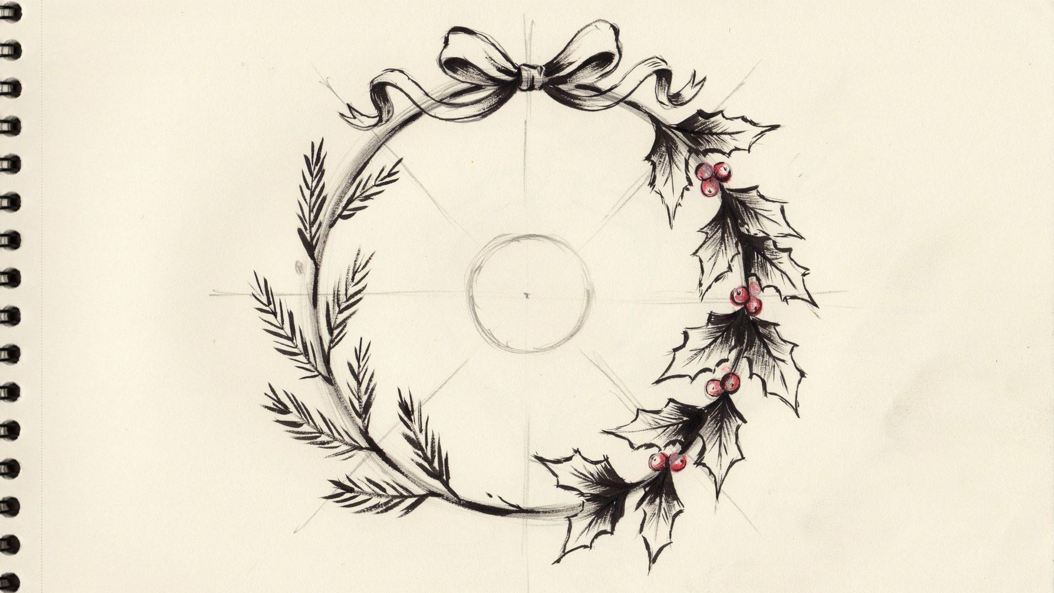 Wreath with hand-drawn branches demonstrates layering leaves for natural fullness.