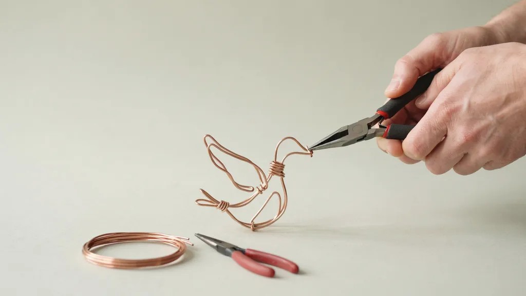 Hands shaping wire into artistic forms with examples of simple wire sculptures like heart and abstract shapes