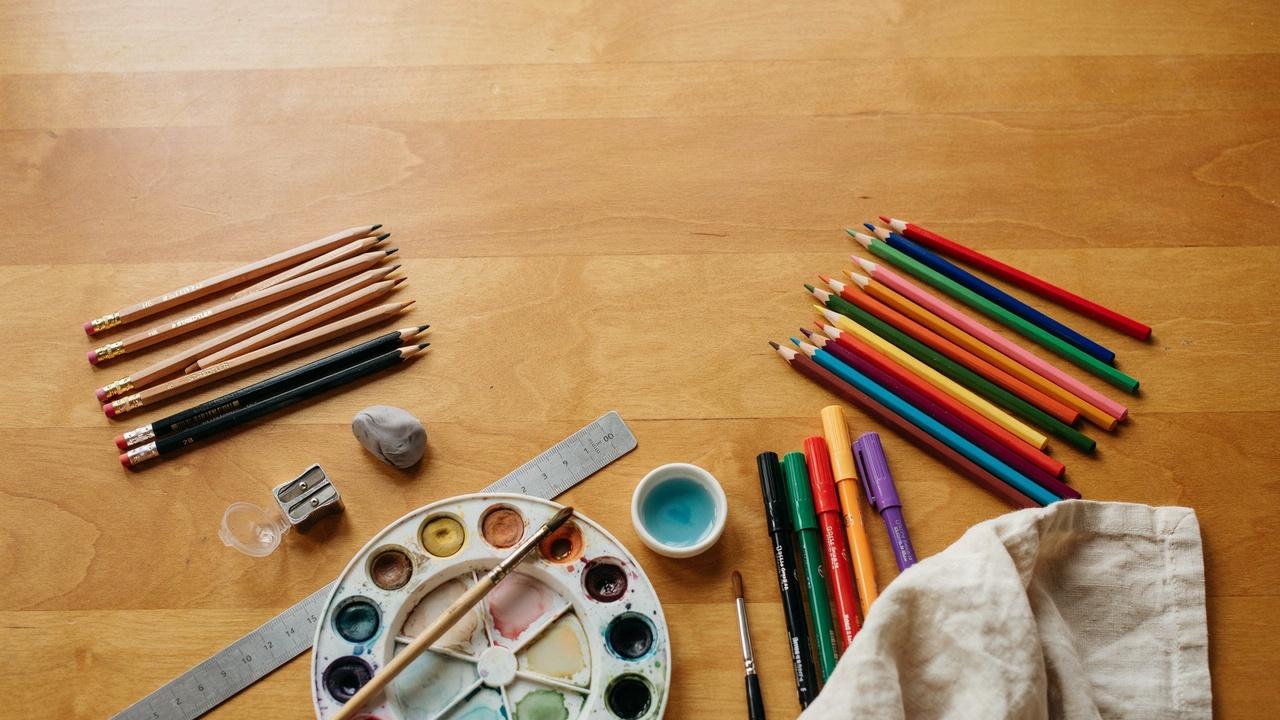 Essential art supplies for drawing an elephant.